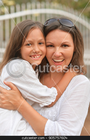 To use this stock image in your creative project, please select the size you need over to the right and click the "Add to Cart" button.
Your downloaded image will come with the Cutcaster watermark removed so don’t worry about the watermark you see on this page. Mother hugging little daughter stock photo, Mother hugging her cute little daughter on seashore by Ruslan Huzau