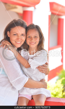 To use this stock image in your creative project, please select the size you need over to the right and click the "Add to Cart" button.
Your downloaded image will come with the Cutcaster watermark removed so don’t worry about the watermark you see on this page. Mother hugging little daughter stock photo, Mother hugging her cute little daughter on seashore by Ruslan Huzau