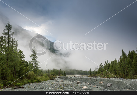 To use this stock image in your creative project, please select the size you need over to the right and click the "Add to Cart" button.
Your downloaded image will come with the Cutcaster watermark removed so don’t worry about the watermark you see on this page. Fog step between mountain. stock photo, Fog step between mountain in the Ailai mountains, Russia by Vassiliy Kochetkov