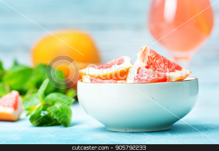 To use this stock image in your creative project, please select the size you need over to the right and click the "Add to Cart" button.
Your downloaded image will come with the Cutcaster watermark removed so don’t worry about the watermark you see on this page. grapefruit and juice stock photo, juice and fresh grapefruit on a table by tycoon