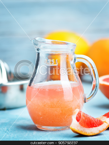 To use this stock image in your creative project, please select the size you need over to the right and click the "Add to Cart" button.
Your downloaded image will come with the Cutcaster watermark removed so don’t worry about the watermark you see on this page. grapefruit and juice stock photo, juice and fresh grapefruit on a table by tycoon