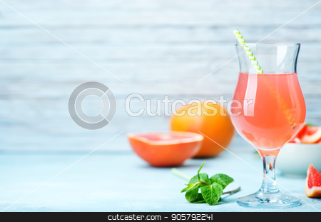 To use this stock image in your creative project, please select the size you need over to the right and click the "Add to Cart" button.
Your downloaded image will come with the Cutcaster watermark removed so don’t worry about the watermark you see on this page. grapefruit and juice stock photo, juice and fresh grapefruit on a table by tycoon