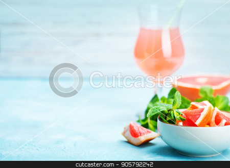To use this stock image in your creative project, please select the size you need over to the right and click the "Add to Cart" button.
Your downloaded image will come with the Cutcaster watermark removed so don’t worry about the watermark you see on this page. grapefruit and juice stock photo, juice and fresh grapefruit on a table by tycoon