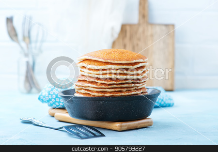 To use this stock image in your creative project, please select the size you need over to the right and click the "Add to Cart" button.
Your downloaded image will come with the Cutcaster watermark removed so don’t worry about the watermark you see on this page. pancakes stock photo, sweet pancakes on plate and on a table by tycoon