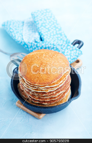 To use this stock image in your creative project, please select the size you need over to the right and click the "Add to Cart" button.
Your downloaded image will come with the Cutcaster watermark removed so don’t worry about the watermark you see on this page. pancakes stock photo, sweet pancakes on plate and on a table by tycoon