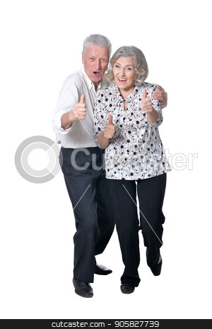 To use this stock image in your creative project, please select the size you need over to the right and click the "Add to Cart" button.
Your downloaded image will come with the Cutcaster watermark removed so don’t worry about the watermark you see on this page. Senior couple showing thumbs up stock photo, Senior couple smiling with thumbs up isolated on white background by Ruslan Huzau
