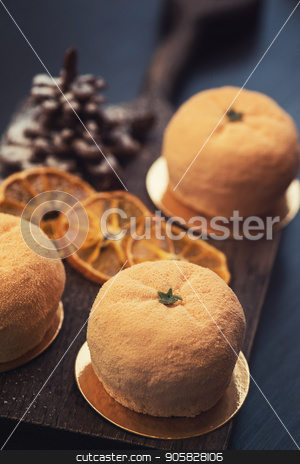 To use this stock image in your creative project, please select the size you need over to the right and click the "Add to Cart" button.
Your downloaded image will come with the Cutcaster watermark removed so don’t worry about the watermark you see on this page. Tasty dessert for xmas stock photo, Tasty dessert as orange fruit with chocolate fir-tree for new year holiday by olinchuk