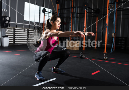 To use this stock image in your creative project, please select the size you need over to the right and click the "Add to Cart" button.
Your downloaded image will come with the Cutcaster watermark removed so don’t worry about the watermark you see on this page. Athletic girl does squat exercises at the gym stock photo, Determined athletic girl does squat exercises at the gym by Federico Caputo
