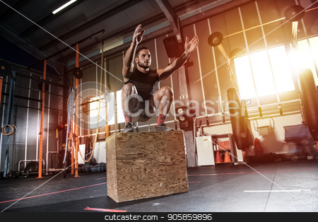 To use this stock image in your creative project, please select the size you need over to the right and click the "Add to Cart" button.
Your downloaded image will come with the Cutcaster watermark removed so don’t worry about the watermark you see on this page. Athletic man does box jump exercises at the gym stock photo, Determined athletic man does box jump exercises at the gym by Federico Caputo
