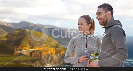 To use this stock image in your creative project, please select the size you need over to the right and click the "Add to Cart" button.
Your downloaded image will come with the Cutcaster watermark removed so don’t worry about the watermark you see on this page. couple of sportsmen with water over big sur coast stock photo, fitness, sport and people concept - smiling couple with bottles of water over bixby creek bridge on big sur coast of california background by Syda Productions