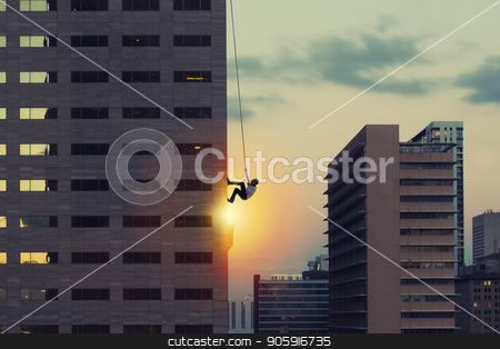 To use this stock image in your creative project, please select the size you need over to the right and click the "Add to Cart" button.
Your downloaded image will come with the Cutcaster watermark removed so don’t worry about the watermark you see on this page. Businessman climb a skyscraper. Achievement business goal and difficult career concept stock photo, Businessman climb a skyscraper with a rope. Achievement business goal and difficult career concept by Federico Caputo