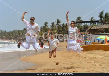 To use this stock image in your creative project, please select the size you need over to the right and click the "Add to Cart" button.
Your downloaded image will come with the Cutcaster watermark removed so don’t worry about the watermark you see on this page. happy family hugging stock photo, Portrait of happy family jumping on sandy beach by Ruslan Huzau