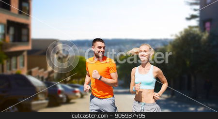To use this stock image in your creative project, please select the size you need over to the right and click the "Add to Cart" button.
Your downloaded image will come with the Cutcaster watermark removed so don’t worry about the watermark you see on this page. smiling couple running stock photo, fitness, sport and healthy lifestyle concept - smiling couple with heart-rate watch running over san francisco city background by Syda Productions