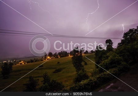 To use this stock image in your creative project, please select the size you need over to the right and click the "Add to Cart" button.
Your downloaded image will come with the Cutcaster watermark removed so don’t worry about the watermark you see on this page. Summer storm in the night landscape stock photo, Summer storm in the night landscape with trees by Ondrej Vladyka