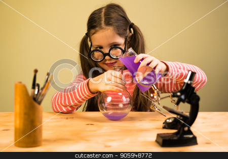 To use this stock image in your creative project, please select the size you need over to the right and click the "Add to Cart" button.
Your downloaded image will come with the Cutcaster watermark removed so don’t worry about the watermark you see on this page. Little Girl Processing Chemical Homework Experiment with Chemical Flasks. Child Education stock photo, Little Girl is Providing Chemical Homework Experiment with Chemical Vessels. Child Education Process by Gideon Ikigai