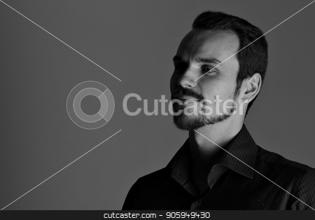 To use this stock image in your creative project, please select the size you need over to the right and click the "Add to Cart" button.
Your downloaded image will come with the Cutcaster watermark removed so don’t worry about the watermark you see on this page. Face of handsome man with fashionable hairstyle half closed in shadow stock photo, Face of handsome man with fashionable hairstyle half closed in shadow by aaalll3110