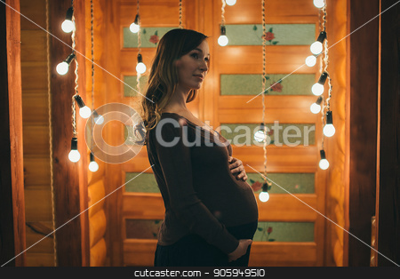 To use this stock image in your creative project, please select the size you need over to the right and click the "Add to Cart" button.
Your downloaded image will come with the Cutcaster watermark removed so don’t worry about the watermark you see on this page. silhouette of Pregnant woman on a lamps background stock photo, silhouette of Pregnant woman on a lamps background by aaalll3110