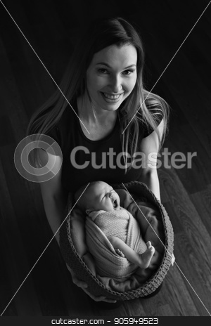 To use this stock image in your creative project, please select the size you need over to the right and click the "Add to Cart" button.
Your downloaded image will come with the Cutcaster watermark removed so don’t worry about the watermark you see on this page. baby on the hands of mother. woman and child stock photo, baby on the hands of mother. woman and child by aaalll3110