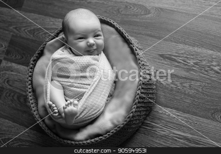 To use this stock image in your creative project, please select the size you need over to the right and click the "Add to Cart" button.
Your downloaded image will come with the Cutcaster watermark removed so don’t worry about the watermark you see on this page. Portrait a little child in a cap lies on a basket. Face of newborn stock photo, Portrait a little child in a cap lies on a basket. Face of newborn by aaalll3110