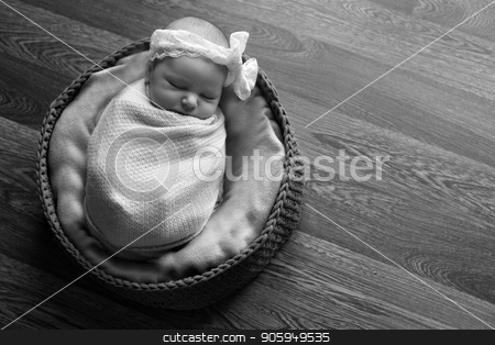 To use this stock image in your creative project, please select the size you need over to the right and click the "Add to Cart" button.
Your downloaded image will come with the Cutcaster watermark removed so don’t worry about the watermark you see on this page. Portrait a little child in a cap lies on a basket. Face of newborn stock photo, Portrait a little child in a cap lies on a basket. Face of newborn by aaalll3110