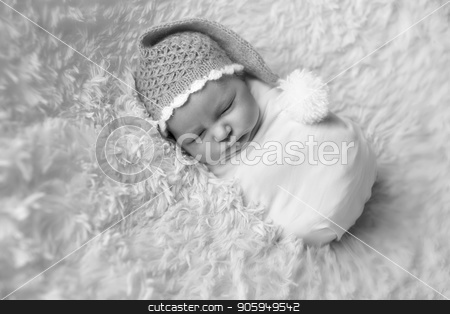 To use this stock image in your creative project, please select the size you need over to the right and click the "Add to Cart" button.
Your downloaded image will come with the Cutcaster watermark removed so don’t worry about the watermark you see on this page. A little child in adiaper lies and sleeping stock photo, A little child in adiaper lies and sleeping by aaalll3110