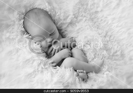 To use this stock image in your creative project, please select the size you need over to the right and click the "Add to Cart" button.
Your downloaded image will come with the Cutcaster watermark removed so don’t worry about the watermark you see on this page. A little child in adiaper lies and sleeping stock photo, A little child in adiaper lies and sleeping by aaalll3110