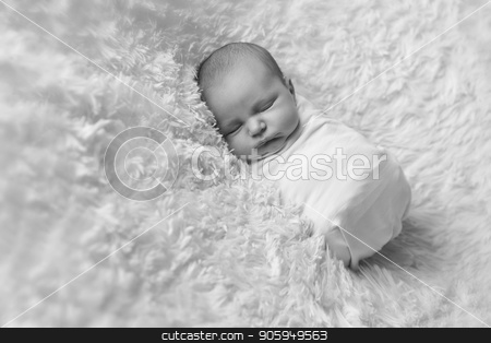 To use this stock image in your creative project, please select the size you need over to the right and click the "Add to Cart" button.
Your downloaded image will come with the Cutcaster watermark removed so don’t worry about the watermark you see on this page. A little child in adiaper lies and sleeping stock photo, A little child in adiaper lies and sleeping by aaalll3110