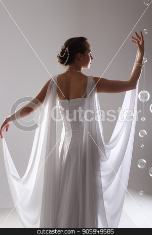 To use this stock image in your creative project, please select the size you need over to the right and click the "Add to Cart" button.
Your downloaded image will come with the Cutcaster watermark removed so don’t worry about the watermark you see on this page. girl in white and with raised hands, attached to the floor dresses. the bride in a dress in Greek style. brunette in pearl jewelry lowered her head. The woman looks like a bird or a bat stock photo, girl in white and with raised hands, attached to the floor dresses. the bride in a dress in Greek style. brunette in pearl jewelry lowered her head. The woman looks like a bird or a bat by aaalll3110