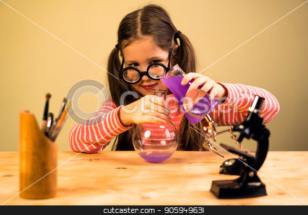 To use this stock image in your creative project, please select the size you need over to the right and click the "Add to Cart" button.
Your downloaded image will come with the Cutcaster watermark removed so don’t worry about the watermark you see on this page. Little Girl Processing Chemical Homework Experiment with Chemical Flasks. Child Education stock photo, Little Girl is Providing Chemical Homework Experiment with Chemical Vessels. Child Education Process by Gideon Ikigai