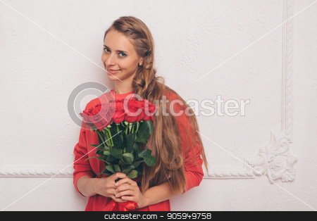To use this stock image in your creative project, please select the size you need over to the right and click the "Add to Cart" button.
Your downloaded image will come with the Cutcaster watermark removed so don’t worry about the watermark you see on this page. portrait of young beautiful blonde woman in red dress with red rose posing at camera on a white background stock photo, portrait of young beautiful blonde woman in red dress with red rose posing at camera on a white background by aaalll3110