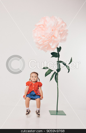 To use this stock image in your creative project, please select the size you need over to the right and click the "Add to Cart" button.
Your downloaded image will come with the Cutcaster watermark removed so don’t worry about the watermark you see on this page. Big flower and little girl in red on white background stock photo, Big flower and little girl in red on white background by aaalll3110