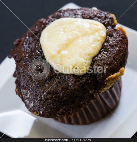 To use this stock image in your creative project, please select the size you need over to the right and click the "Add to Cart" button.
Your downloaded image will come with the Cutcaster watermark removed so don’t worry about the watermark you see on this page. Close up shot of fresh bran muffin with icing stock photo, Close up shot of fresh bran muffin ready to be eaten by Shane Maritch