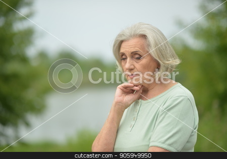 To use this stock image in your creative project, please select the size you need over to the right and click the "Add to Cart" button.
Your downloaded image will come with the Cutcaster watermark removed so don’t worry about the watermark you see on this page. Portrait of sad senior woman stock photo, Portrait of sad senior woman in summer park by Ruslan Huzau