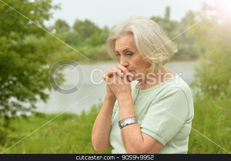 To use this stock image in your creative project, please select the size you need over to the right and click the "Add to Cart" button.
Your downloaded image will come with the Cutcaster watermark removed so don’t worry about the watermark you see on this page. Portrait of sad senior woman stock photo, Portrait of sad senior woman in summer park by Ruslan Huzau