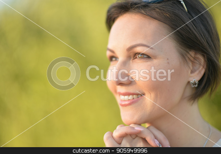 To use this stock image in your creative project, please select the size you need over to the right and click the "Add to Cart" button.
Your downloaded image will come with the Cutcaster watermark removed so don’t worry about the watermark you see on this page. Beautiful young woman resting stock photo, Beautiful young woman resting in summer park by Ruslan Huzau