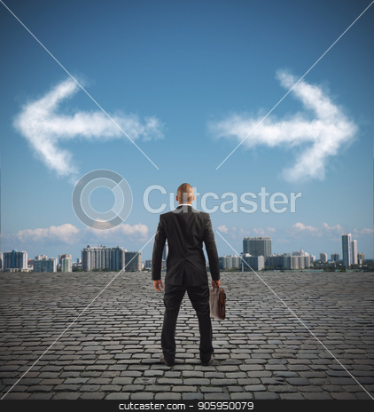 To use this stock image in your creative project, please select the size you need over to the right and click the "Add to Cart" button.
Your downloaded image will come with the Cutcaster watermark removed so don’t worry about the watermark you see on this page. Confused businessman must choose the right way stock photo, Businessman in front of a choice with arrows in opposite directions by Federico Caputo
