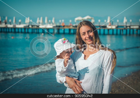 To use this stock image in your creative project, please select the size you need over to the right and click the "Add to Cart" button.
Your downloaded image will come with the Cutcaster watermark removed so don’t worry about the watermark you see on this page. Portrait of a woman with child on a background of sea stock photo, Portrait of a woman with child on a background of sea by aaalll3110