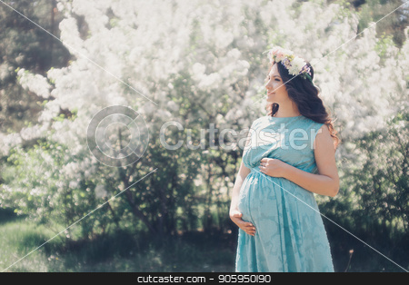 To use this stock image in your creative project, please select the size you need over to the right and click the "Add to Cart" button.
Your downloaded image will come with the Cutcaster watermark removed so don’t worry about the watermark you see on this page. Portrait of a pregnant woman on a background of green foliage stock photo, Portrait of a pregnant woman on a background of green foliage by aaalll3110