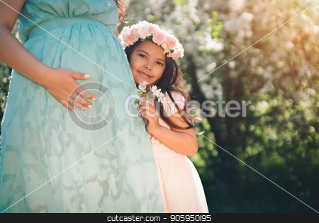 To use this stock image in your creative project, please select the size you need over to the right and click the "Add to Cart" button.
Your downloaded image will come with the Cutcaster watermark removed so don’t worry about the watermark you see on this page. pregnant woman and little girl: family photo outdoors. stock photo, pregnant woman and little girl: family photo outdoors. by aaalll3110
