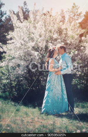 To use this stock image in your creative project, please select the size you need over to the right and click the "Add to Cart" button.
Your downloaded image will come with the Cutcaster watermark removed so don’t worry about the watermark you see on this page. Man hugs his pregnant woman from behind standing in the forest stock photo, Man hugs his pregnant woman from behind standing in the forest by aaalll3110