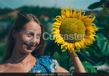 To use this stock image in your creative project, please select the size you need over to the right and click the "Add to Cart" button.
Your downloaded image will come with the Cutcaster watermark removed so don’t worry about the watermark you see on this page. Portrait of a girl with flower on a background of green foliage stock photo, Portrait of a girl with flower on a background of green foliage by aaalll3110