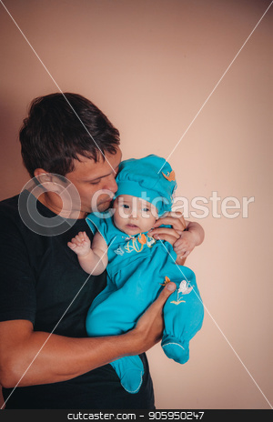 To use this stock image in your creative project, please select the size you need over to the right and click the "Add to Cart" button.
Your downloaded image will come with the Cutcaster watermark removed so don’t worry about the watermark you see on this page. baby on the hands of father. man and child in a black and blue stock photo, baby on the hands of father. man and child in a black and blue by aaalll3110
