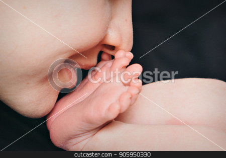 To use this stock image in your creative project, please select the size you need over to the right and click the "Add to Cart" button.
Your downloaded image will come with the Cutcaster watermark removed so don’t worry about the watermark you see on this page. mom kisses a newborn baby. A woman and a small child on a black background. Horizontal posture stock photo, mom kisses a newborn baby. A woman and a small child on a black background. Horizontal posture by aaalll3110