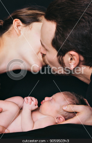 To use this stock image in your creative project, please select the size you need over to the right and click the "Add to Cart" button.
Your downloaded image will come with the Cutcaster watermark removed so don’t worry about the watermark you see on this page. newborn baby lying on the hands of parents on a black background. stock photo, newborn baby lying on the hands of parents on a black background. by aaalll3110