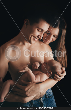 To use this stock image in your creative project, please select the size you need over to the right and click the "Add to Cart" button.
Your downloaded image will come with the Cutcaster watermark removed so don’t worry about the watermark you see on this page. newborn baby lying on the hands of parents on a black background. stock photo, newborn baby lying on the hands of parents on a black background. by aaalll3110