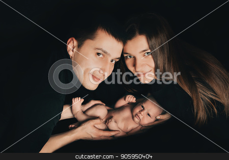 To use this stock image in your creative project, please select the size you need over to the right and click the "Add to Cart" button.
Your downloaded image will come with the Cutcaster watermark removed so don’t worry about the watermark you see on this page. newborn baby lying on the hands of parents on a black background. Imitation of a baby in the womb. beautiful little girl sleeping lying on her back. stock photo, newborn baby lying on the hands of parents on a black background. Imitation of a baby in the womb. beautiful little girl sleeping lying on her back. A man and a woman look into each other's eyes. Parents face to face by aaalll3110