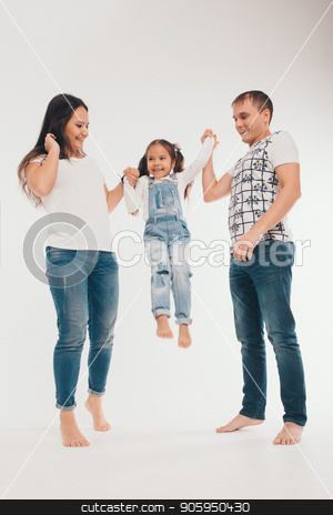 To use this stock image in your creative project, please select the size you need over to the right and click the "Add to Cart" button.
Your downloaded image will come with the Cutcaster watermark removed so don’t worry about the watermark you see on this page. Portrait of a girl who holds her parents ' hands on a white background stock photo, Portrait of a girl who holds her parents ' hands on a white background by aaalll3110