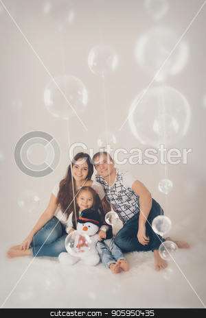To use this stock image in your creative project, please select the size you need over to the right and click the "Add to Cart" button.
Your downloaded image will come with the Cutcaster watermark removed so don’t worry about the watermark you see on this page. Portrait of a girl who holds her parents ' hands on a white background stock photo, Portrait of a girl who holds her parents ' hands on a white background by aaalll3110