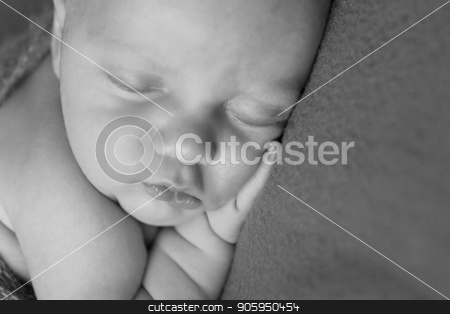 To use this stock image in your creative project, please select the size you need over to the right and click the "Add to Cart" button.
Your downloaded image will come with the Cutcaster watermark removed so don’t worry about the watermark you see on this page. newborn baby lying on a white and black background. Imitation of a baby in the womb. beautiful little child sleeping lying on her tummy. Portrait of newborn stock photo, newborn baby lying on a white and black background. Imitation of a baby in the womb. beautiful little child sleeping lying on her tummy. Portrait of newborn by aaalll3110