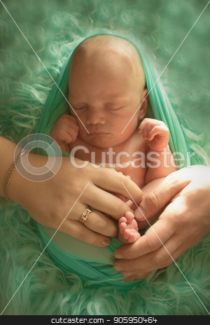 To use this stock image in your creative project, please select the size you need over to the right and click the "Add to Cart" button.
Your downloaded image will come with the Cutcaster watermark removed so don’t worry about the watermark you see on this page. A little child in a greeen diaper lies on a green background stock photo, A little child in a green diaper lies on a green background by aaalll3110